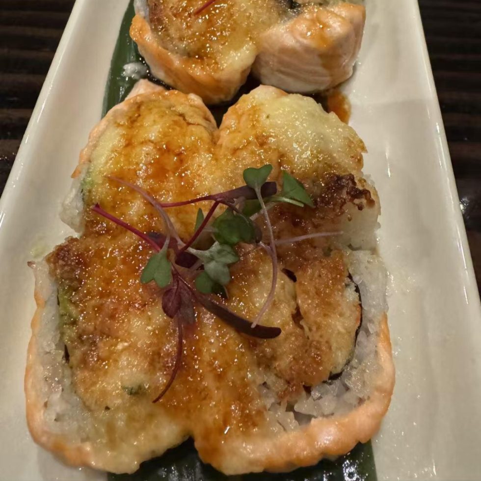 Baked salmon roll with torched topping
